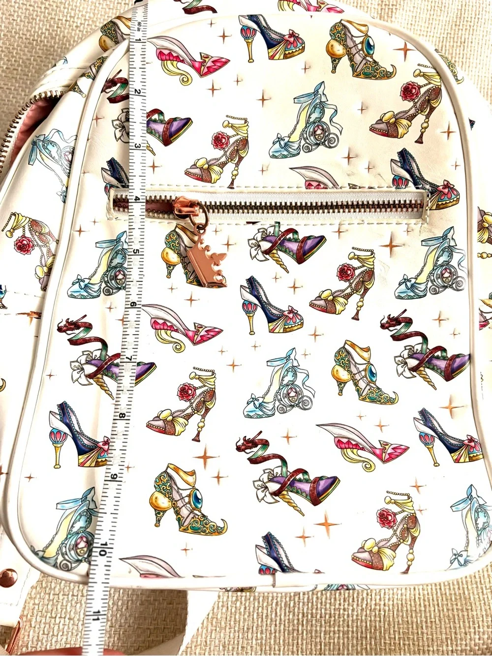 Loungefly White Mini Backpack with Multicolor Shoe Print